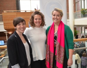 Meg Landfried (left) poses with capstone teaching assistants Melissa Cox (center) and Christine Agnew-Brune during a final presentation of team projects.