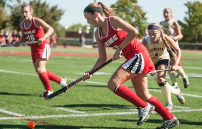 Taylor rushes toward the goal during a college field hockey match. (Contribute photo)