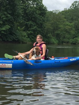 Amanda and her pooch enjoy a paddle.