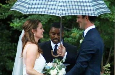 Matt and his wife share wedding vows during a storm.