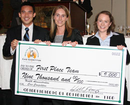 (L-R) Greg Chang, Jessica Moore and Michelle Sonia accept first prize in a national case study competition.