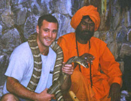 Darren Treml handles a snake in Nepal.