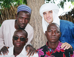 Chris Deery, top right, celebrates Ramadan with three friends from the village.