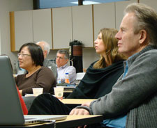UNC executive doctoral students and Dr. Egil Marstein (right, foreground), of the Center for Health Management Studies at the BI Norwegian School of Management, listen to a presentation.