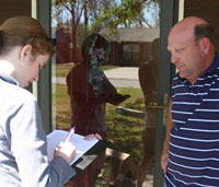 Morgan Johnson of the NC Center for Public Health Preparedness interviews a Gulf Coast resident about public health information he received before and after Hurricane Katrina.