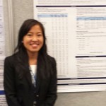 Caroleen Quach stands in front of her winning research poster.