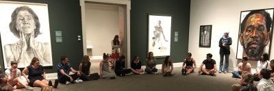 Health Behavior student gather in a circle in the Ackland Art Museum.