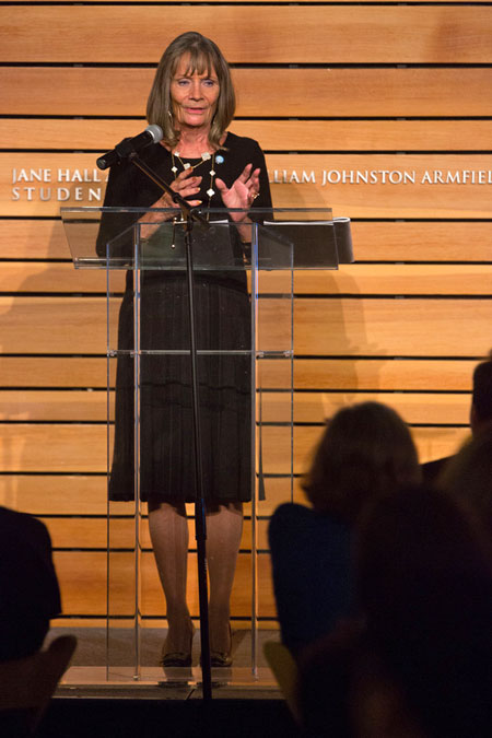 At the Nov. 6 World of Difference dinner, held annual for generous donors to the School, Joan Gillings announces her $1.2 million gift to begin renovations on Rosenau auditorium.