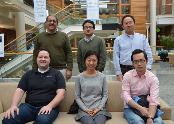 Winners of ENAR's Distinguished Student Paper Award posed recently with their advisers. On the first row, left to right are Tom Stewart, Eunjee Lee and Lu Mao. (Not pictured is Dr. Guanhua Chen.) On the back row are Drs. Joseph Ibrahim, Hongtu Zhu and Danyu Lin, biostatistics professors. 