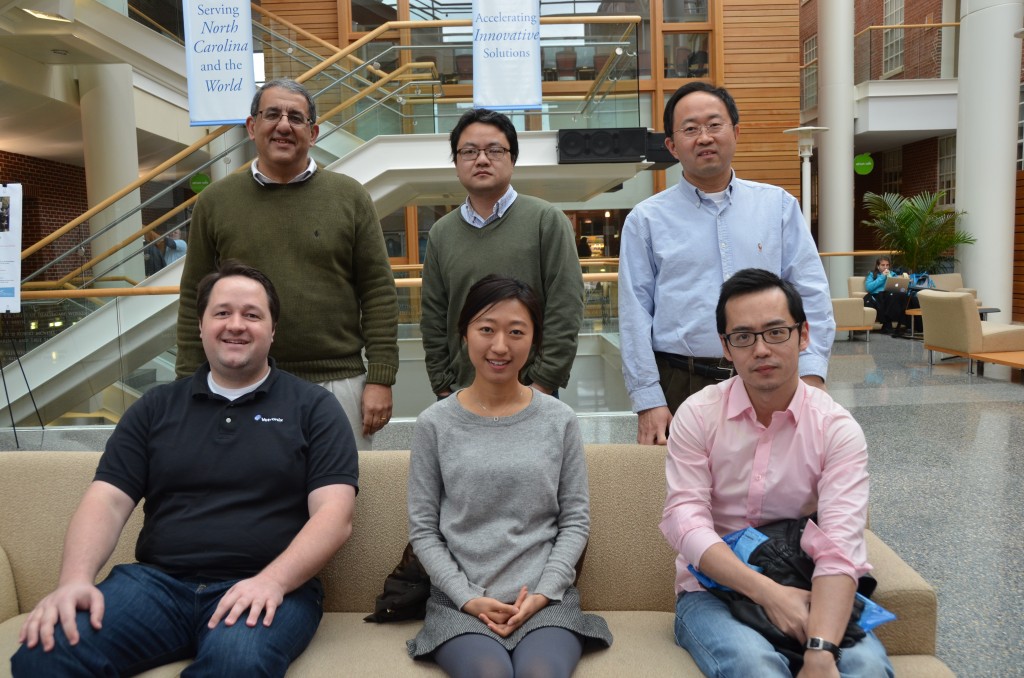 Winners of ENAR's Distinguished Student Paper Award posed in February with their advisers. On the front row (l-r) are Tom Stewart, Eunjee Lee and Lu Mao. (Not pictured is Dr. Guanhua Chen.) On the back row (l-r) are Drs.  Joseph Ibrahaim, Hongtu Zhu and Danya Lin, biostatistics professors.