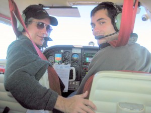 An avid pilot, Dr. Herrington (left) prepares for a flight with his son Ben. (Contributed photo)