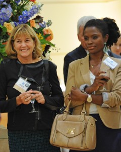 Health Behavior chair Dr. Leslie Lytle (l) and Nancy Legrand listened attentively to a speaker at the Charlotte event.