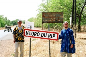 Dr. Jim Herrington (left) and his son Chris attended a "Roll Back Malaria" concert in Nioro du Rip, Senegal, in 2005. (Contributed photo)