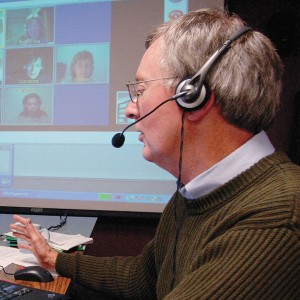 Dr. Brooks, leading an early online class.