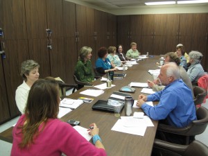 A community coalition of physicians, clinic managers, epidemiologists, members of the faith community and others meet at the Wilkes County (N.C.) health department to discuss Project Lazarus. (Photo by Nab Dasgupta)
