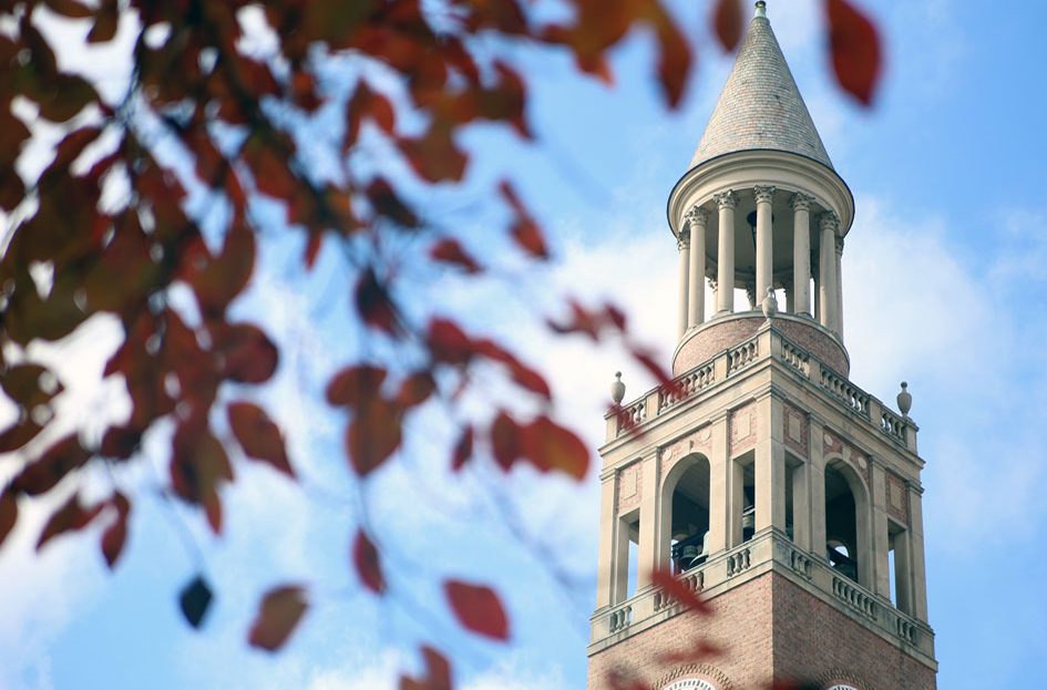 The autumn sun shines on the bell tower.