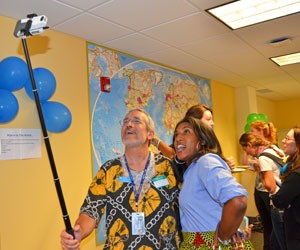 Gillings Global Gateway director Dr. James Herrington poses for a 'selfie' with 2015 alumna Dr. Patsy Polston.