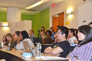 The audience at GillingsX listens to Chen Zhang's presentation on "gamifying" public health.