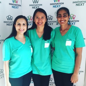 (L-R) Cristina Leos and Liz Chen, doctoral students in health behavior at the Gillings School, and Vichi Jagannathan, an MBA candidate at Yale, posed after pitching "Real Talk," the award-winning mobile app they designed.