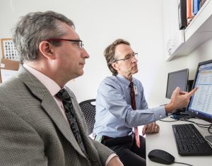 Drs. Michael Kosorok and George Retsch-Bogart review data on cystic fibrosis screening. 