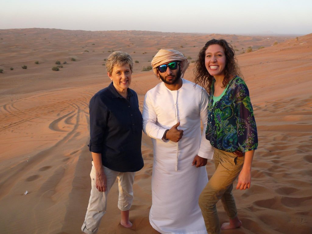 Michelle Ballasiotes (right) goes dune bashing in the United Arab Emirates with her mom and a driver. (Contributed photo)
