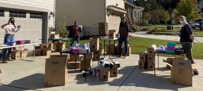 Students pack boxes.