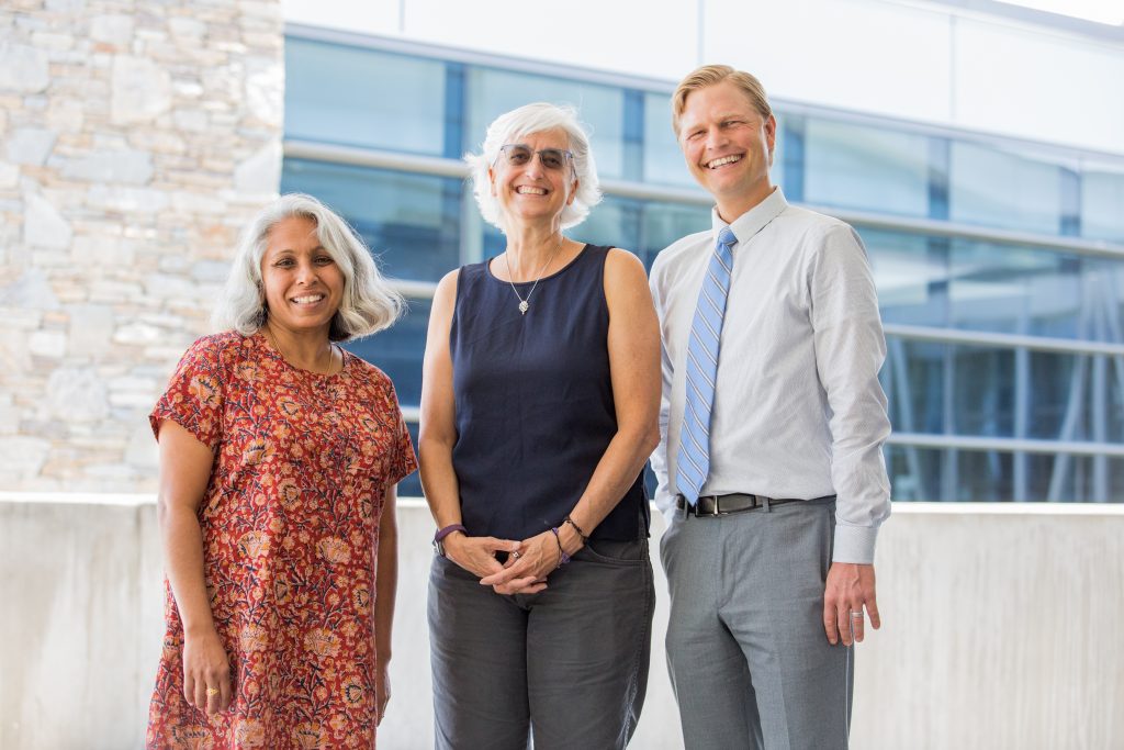 Dr. Travis Johnson (right), interim director of the Asheville MPH program, poses with Drs. Ameena Batada (left) and Amy Lanou, consultants and instructors in the program.