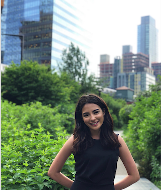 Anshula Nathan poses outside of the New York City Department of Health and Mental Hygiene (NYC DOHMH) where she completed her practicum.
