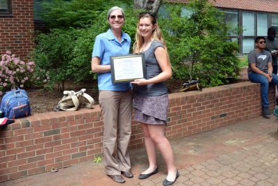 Dr. Turpin presents Eliza Harrison with the 2019 BSPH Distinguished Undergraduate Scholar Award in Environmental Sciences and Engineering.