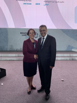 Dr. Emily Gower poses with WHO Director-General Dr. Tedros Adhanom Ghebreyesus.