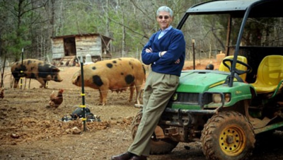 Dr. Michael Aitken conducts research at a North Carolina hog farm.