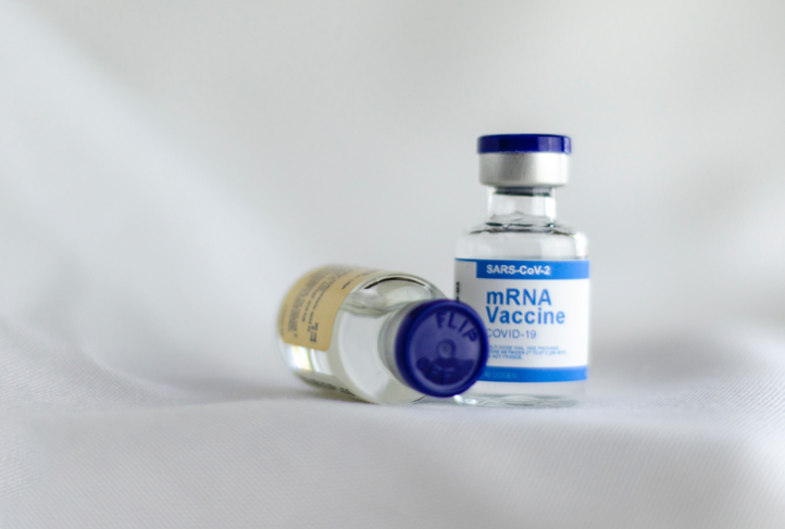 Two vials of COVID-19 vaccines are ready to be used.