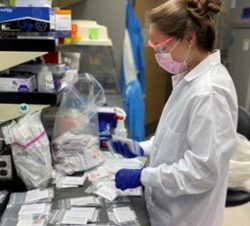 Camille Morgan processing samples in the Infectious Disease Epidemiology and Ecology Lab, September 2021