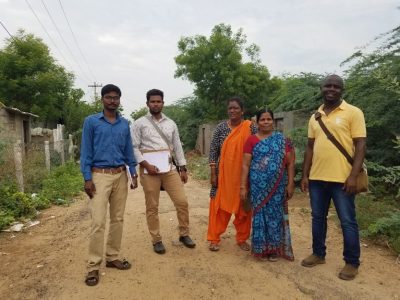 Photo (E) Musa with his field team in India after conducting a community transect walk in Trichy, Tamil Nadu to get an overview of the sanitation and faecal sludge management practices in the study area