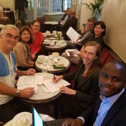 Photo (C): Musa meeting with Sanitation experts including his former Advisor Professor Barbara Evans (in Red at the far end), at the World Water Week 2017 in Stockholm, as they prepare for a joint session on Pathogen flows in Urban Communities