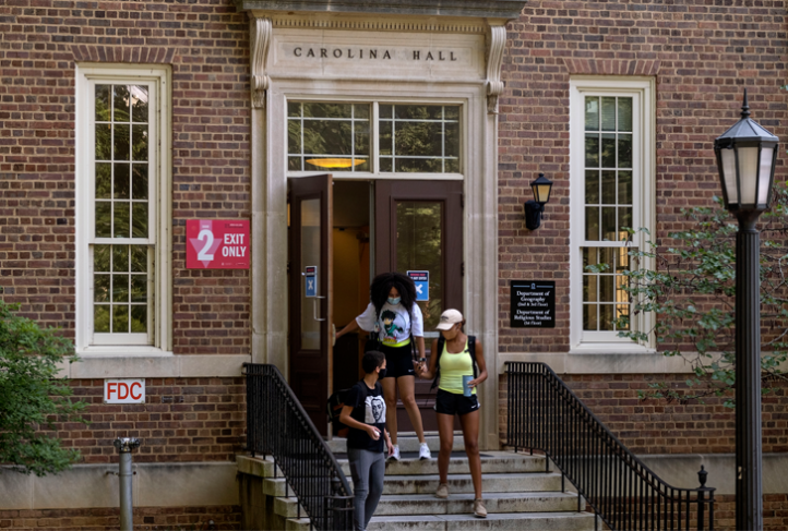 Students exit Carolina Hall during the first day of Fall 2020 classes.