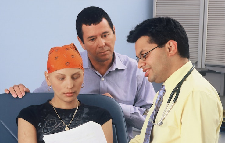 A cancer patient consults with a health care provider.