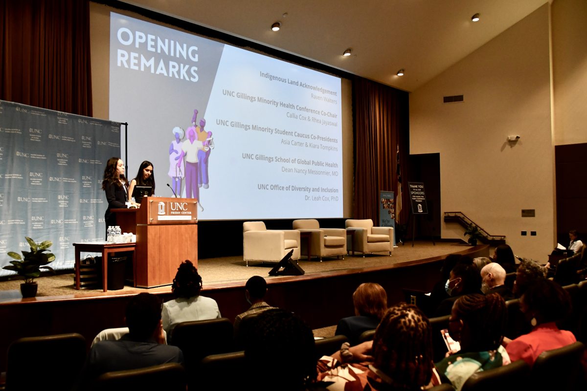 Callia Cox (left) and Rhea Jayaswal deliver opening remarks at the 2023 Minority Health Conference.