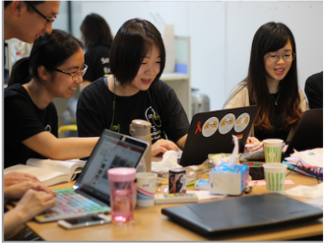 Chunyan Li and participants worked together in a hackathon.
