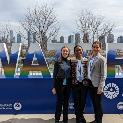 UNC Gillings doctoral students Lucy Tantum, Silvia Landa and Hanna Brosky outside the United Nations Secretariat Building in Manhattan, New York